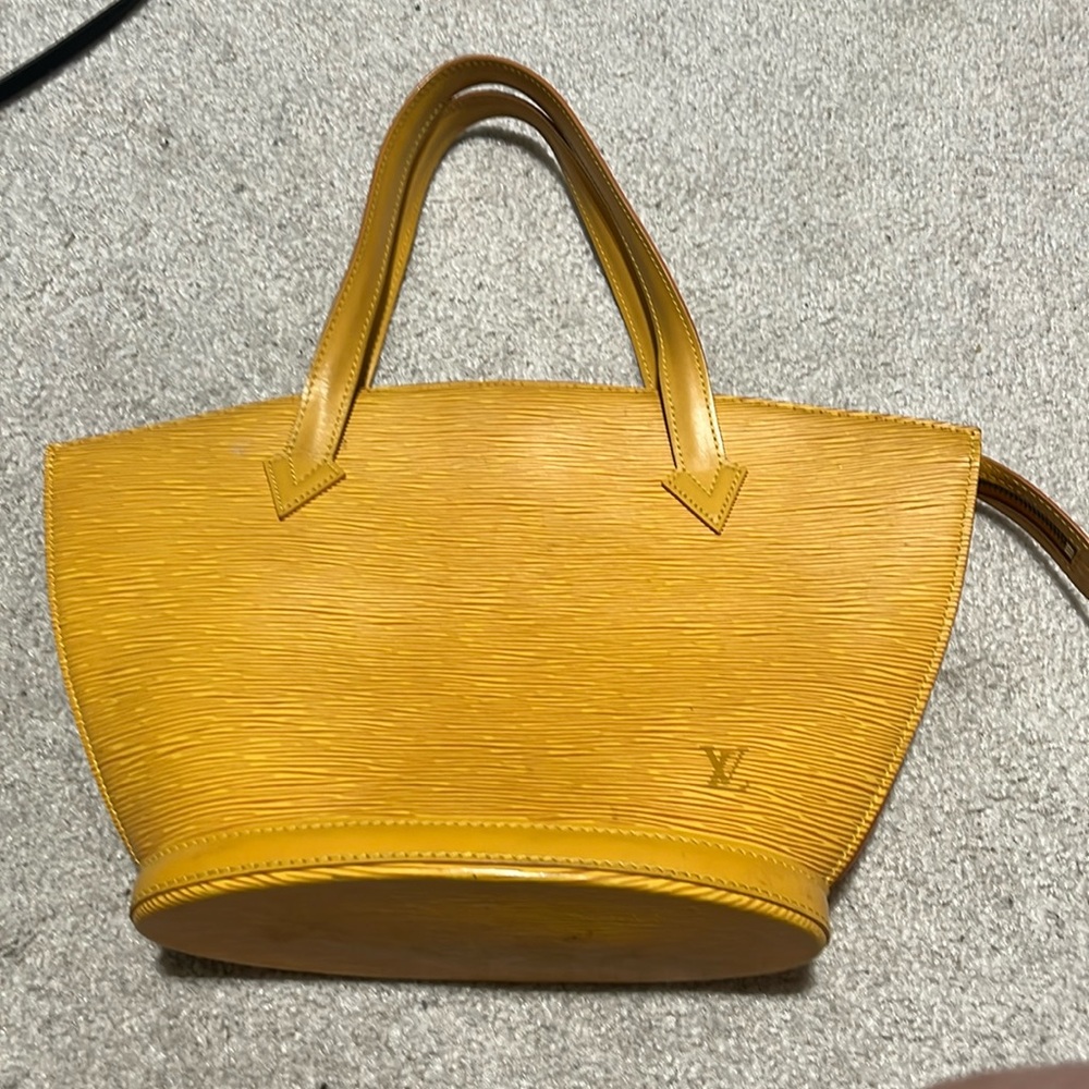 Louis Vuitton authentic vintage Epi leather purse.